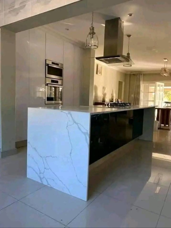 Waterfall Countertops installation by BMB Granite