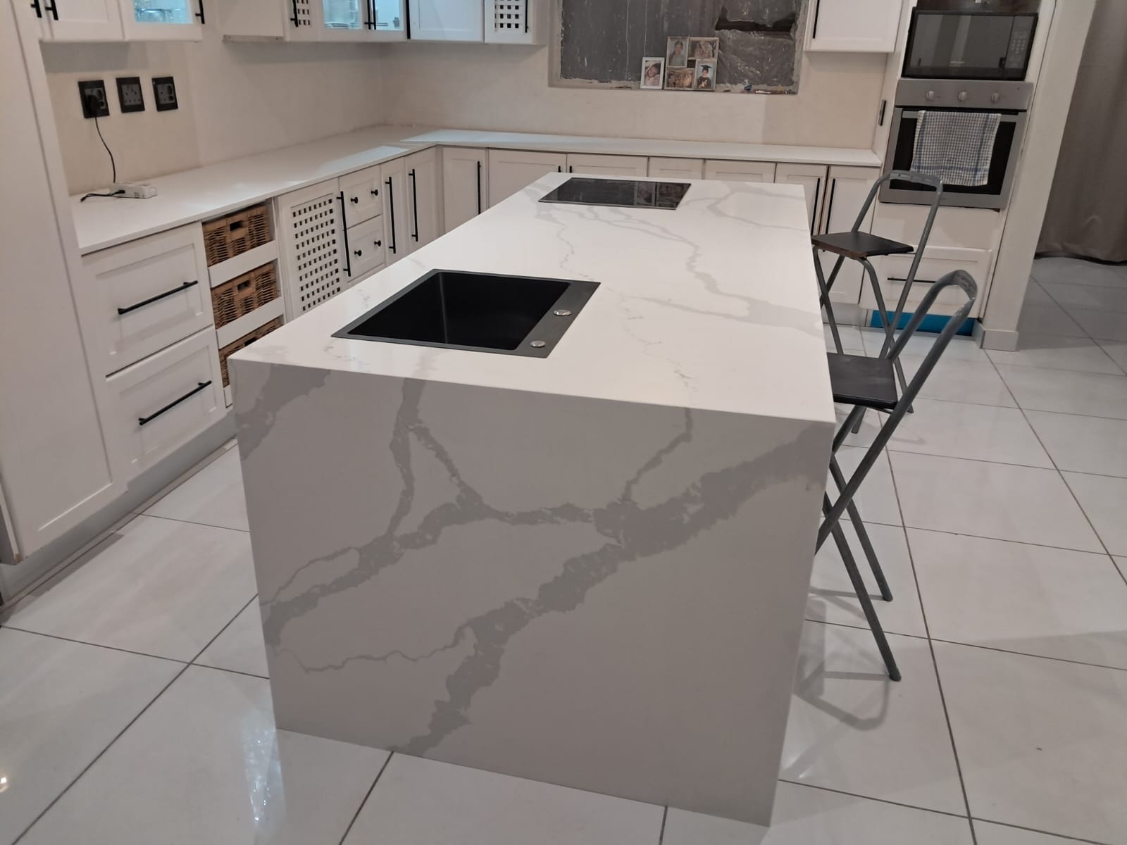 Waterfall Countertops installation by BMB Granite