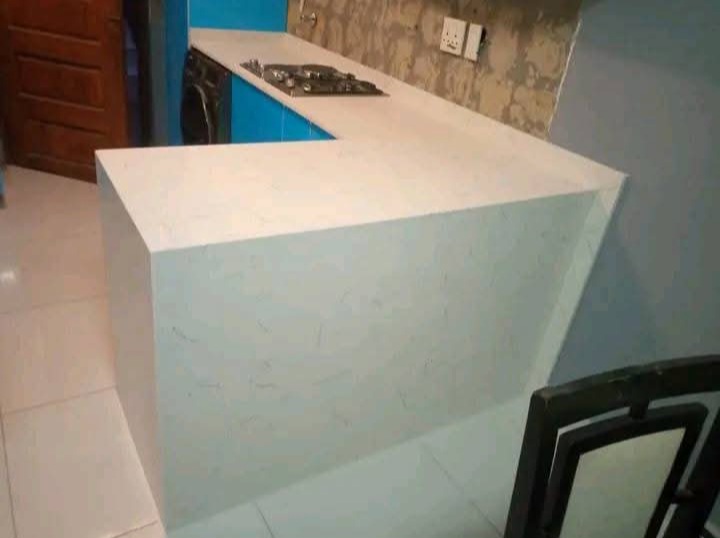 Waterfall Countertops installation by BMB Granite