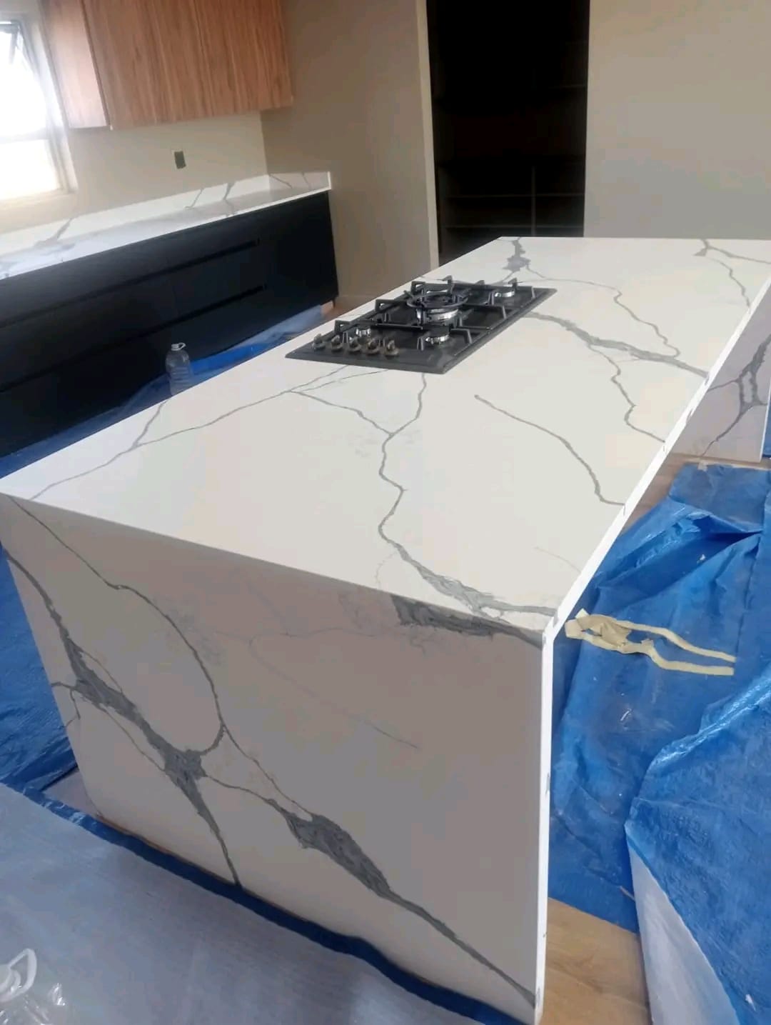 Waterfall Countertops installation by BMB Granite